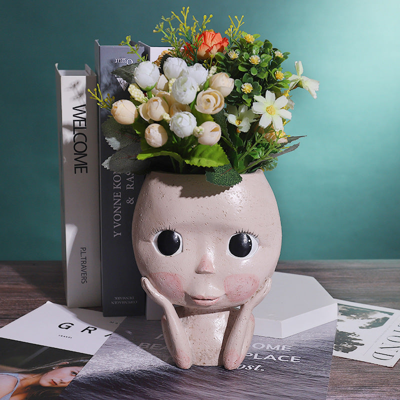 Face planter styled on a shelf