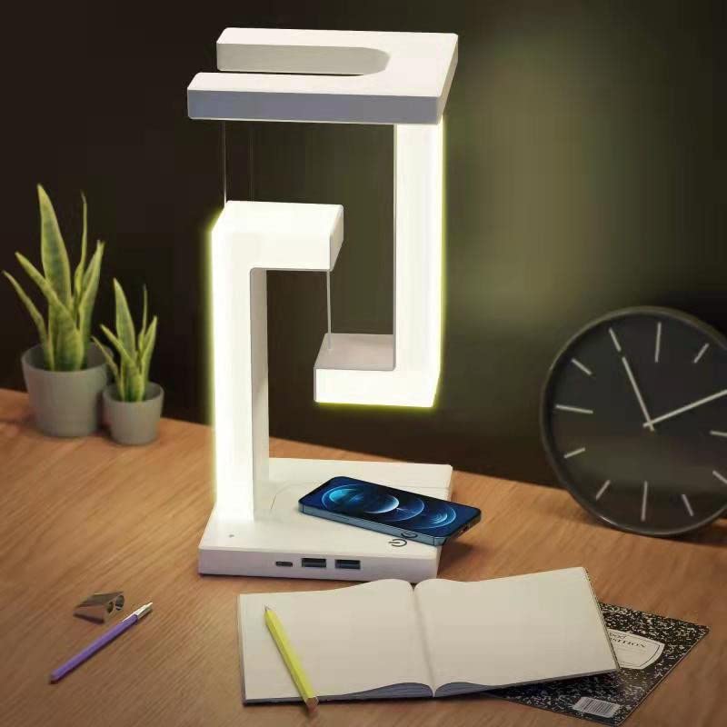 Floating orb lamp glowing on a desk