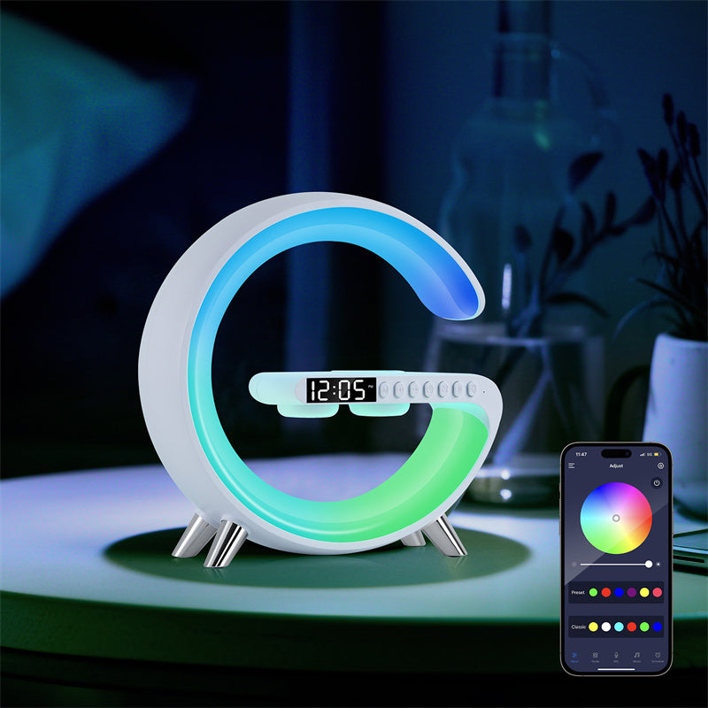 G-Shape LED lamp charging a phone wirelessly